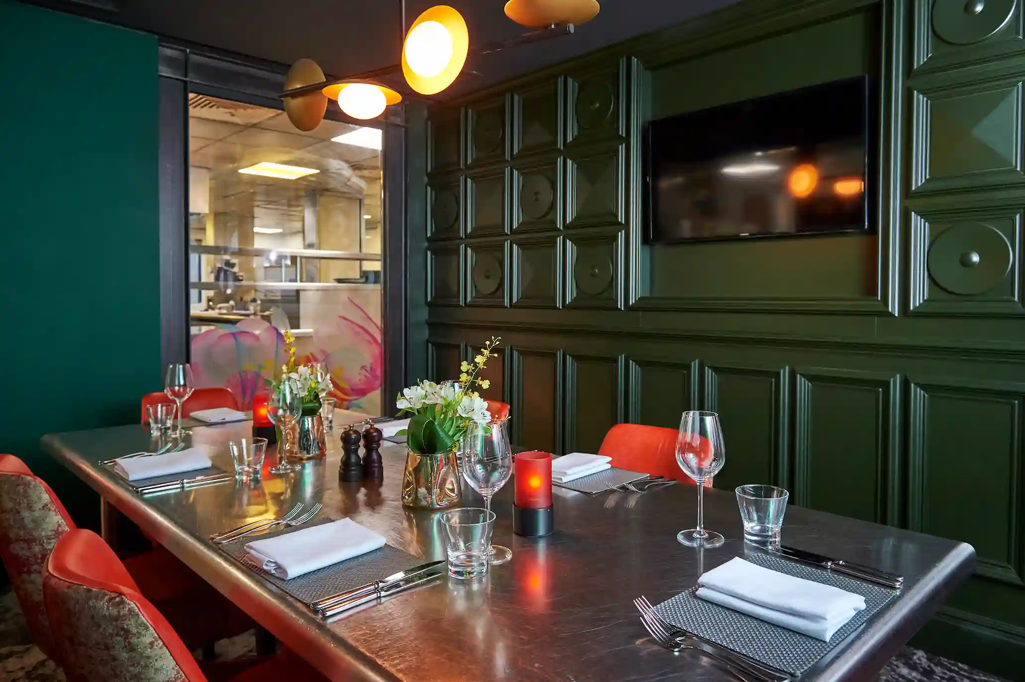 A beautifully arranged dining table with elegantly set place settings.